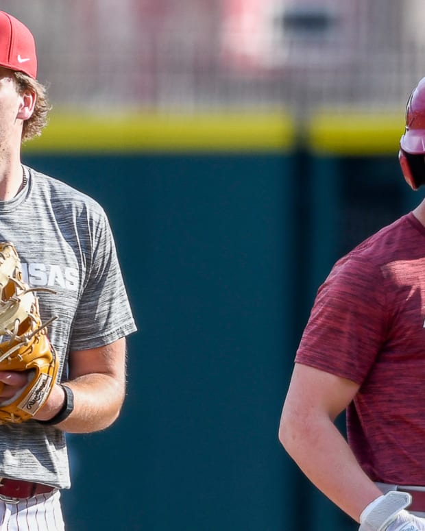 Razorbacks' first baseman Ben McLaughlin in practice Friday